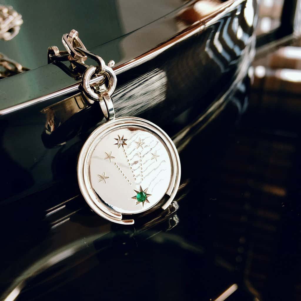 MONEDA SOHUM ESTRELLAS ESMERALDA PLATA