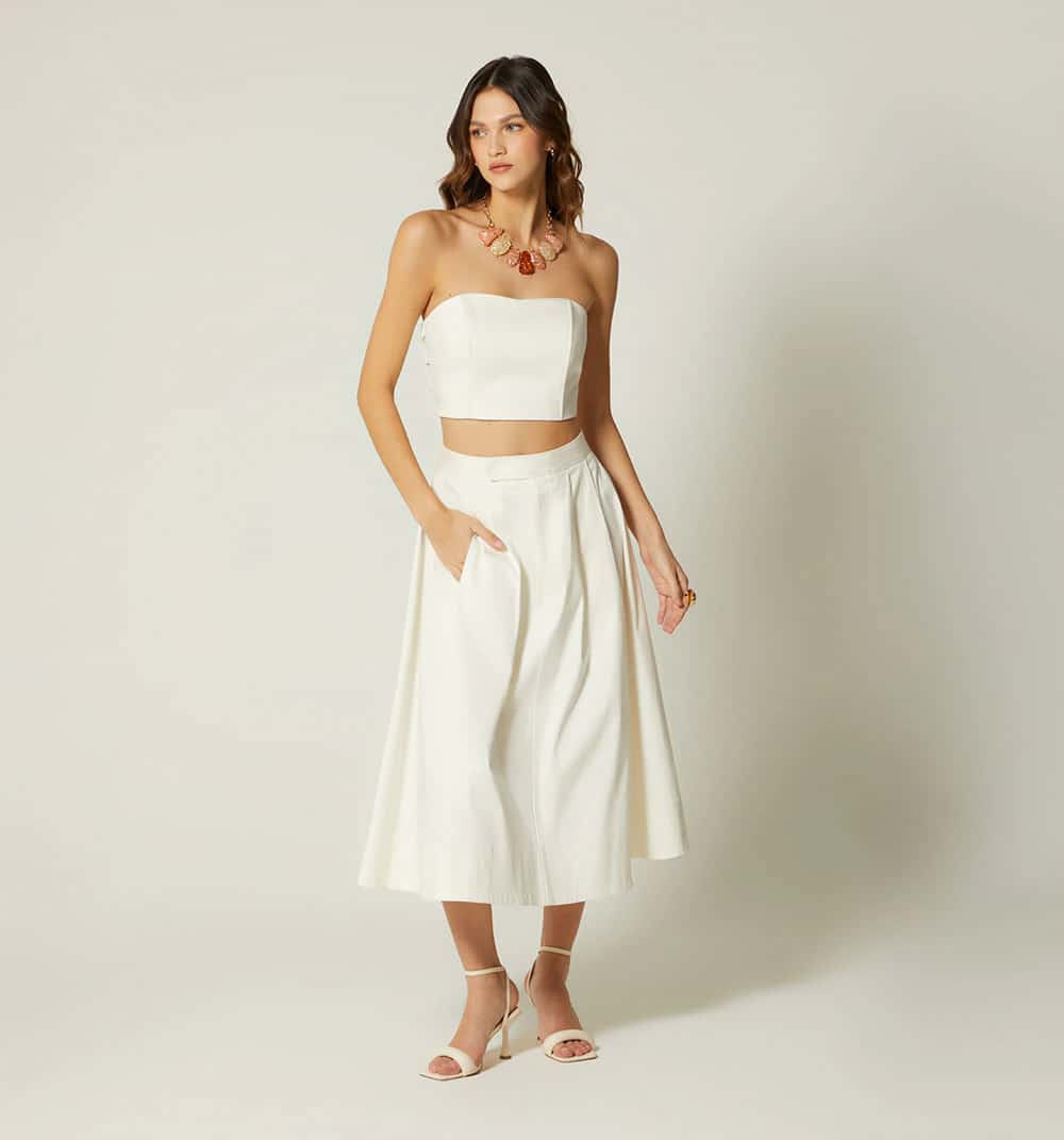 Falda midi con prenses y bolsillos