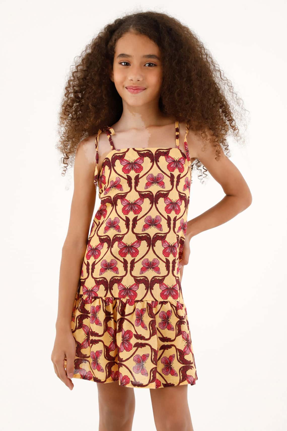 Vestido estampado con bolero en ruedo para niña