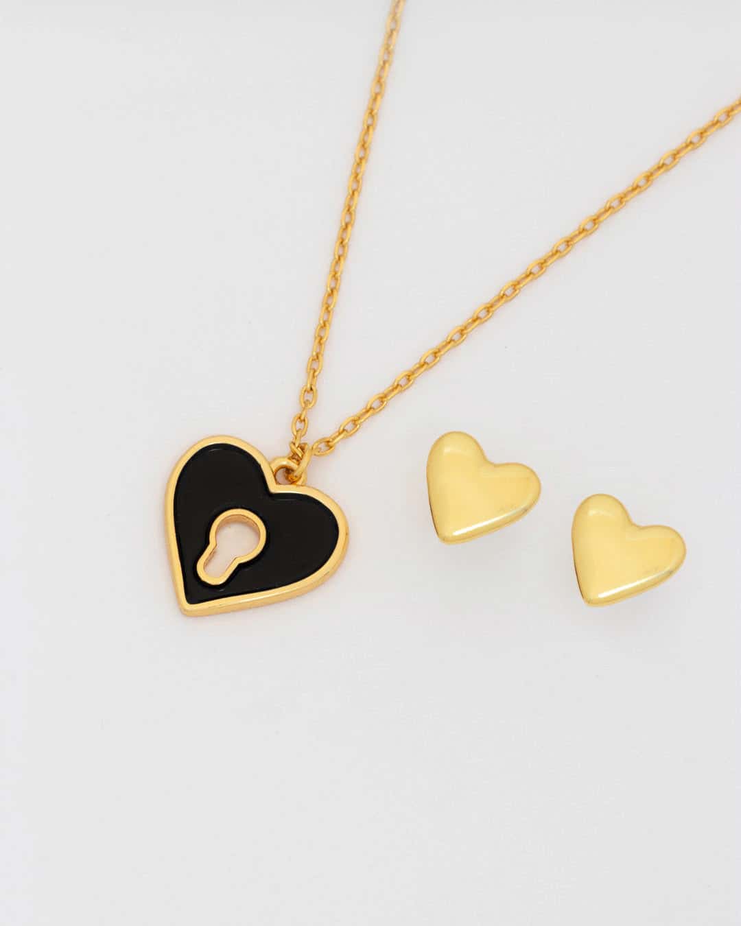 Collar Corazón Cerrojo Negro + Aretes