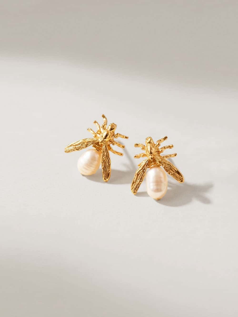 Aretes topo mini hormiga perla - miniatura 1