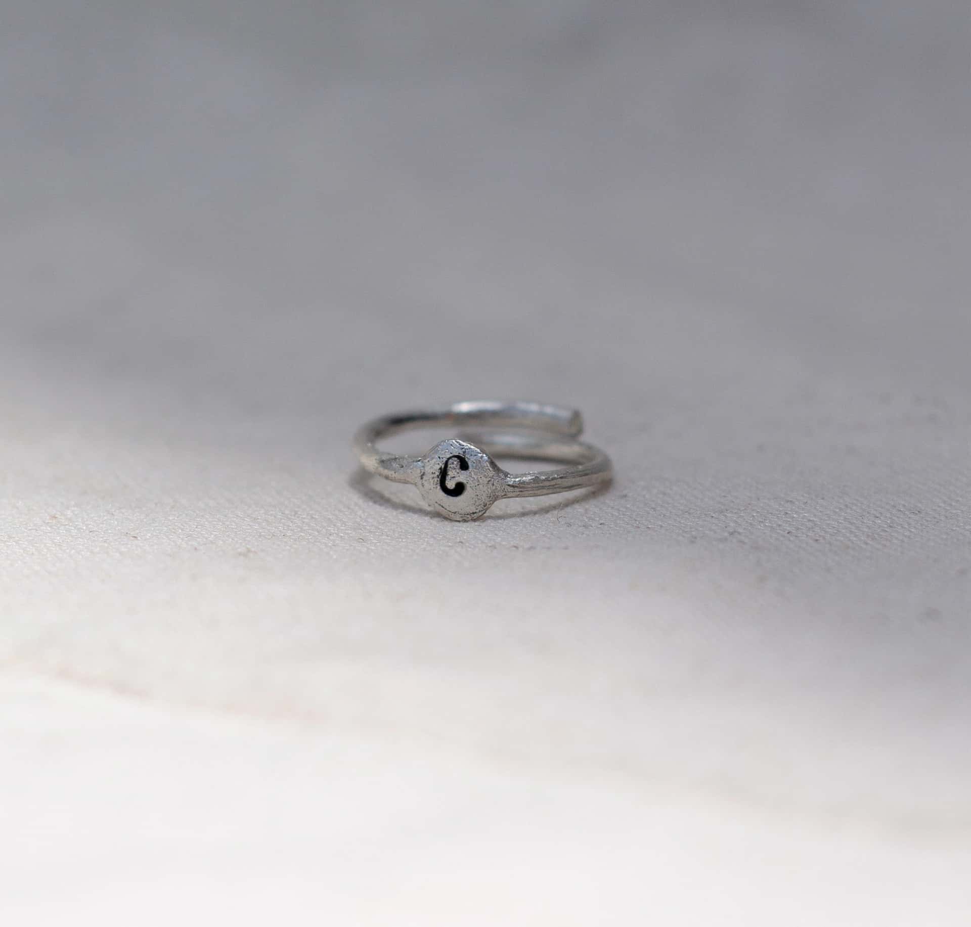 Anillo letra (Plata ley950)