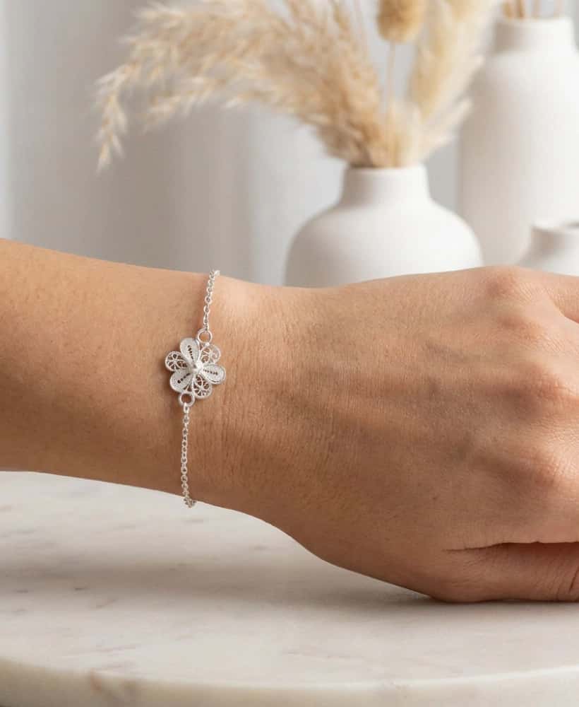 Pulsera flor mediana en plata ley 950