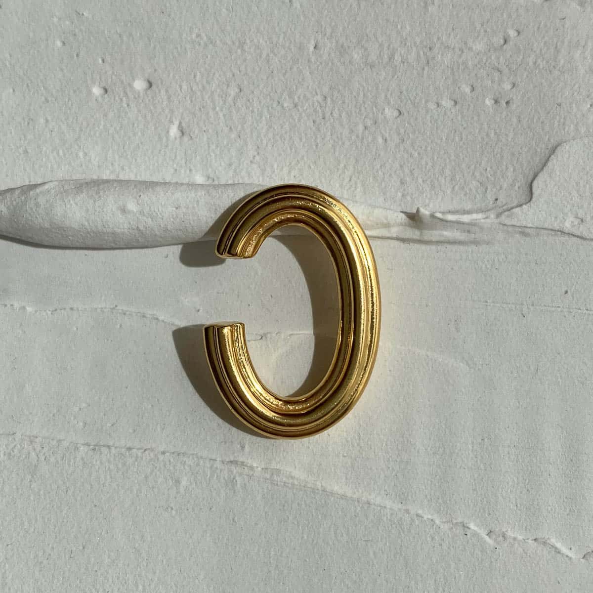 EAR CUFF PARALLEL ORO