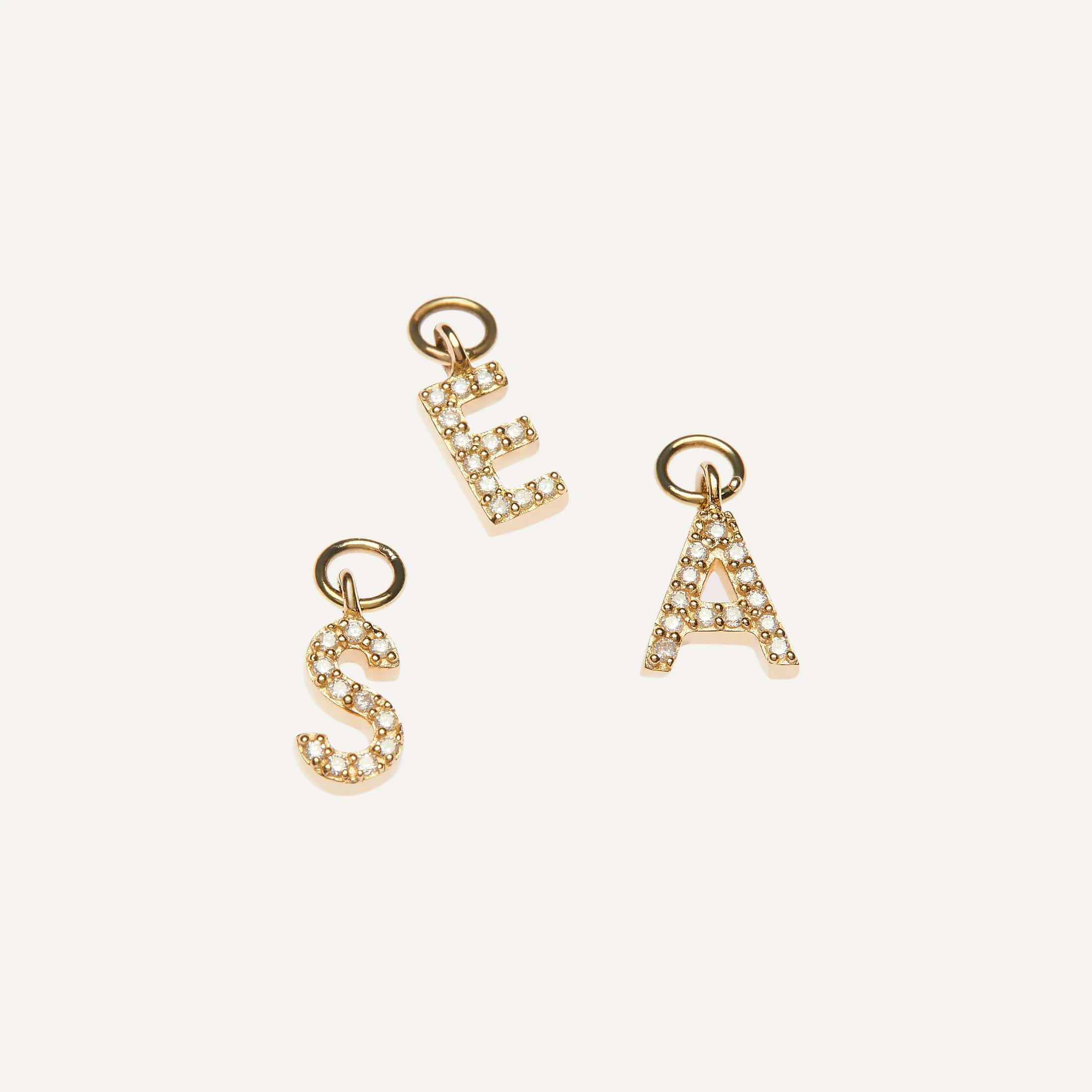Charms huggies letras diamantes