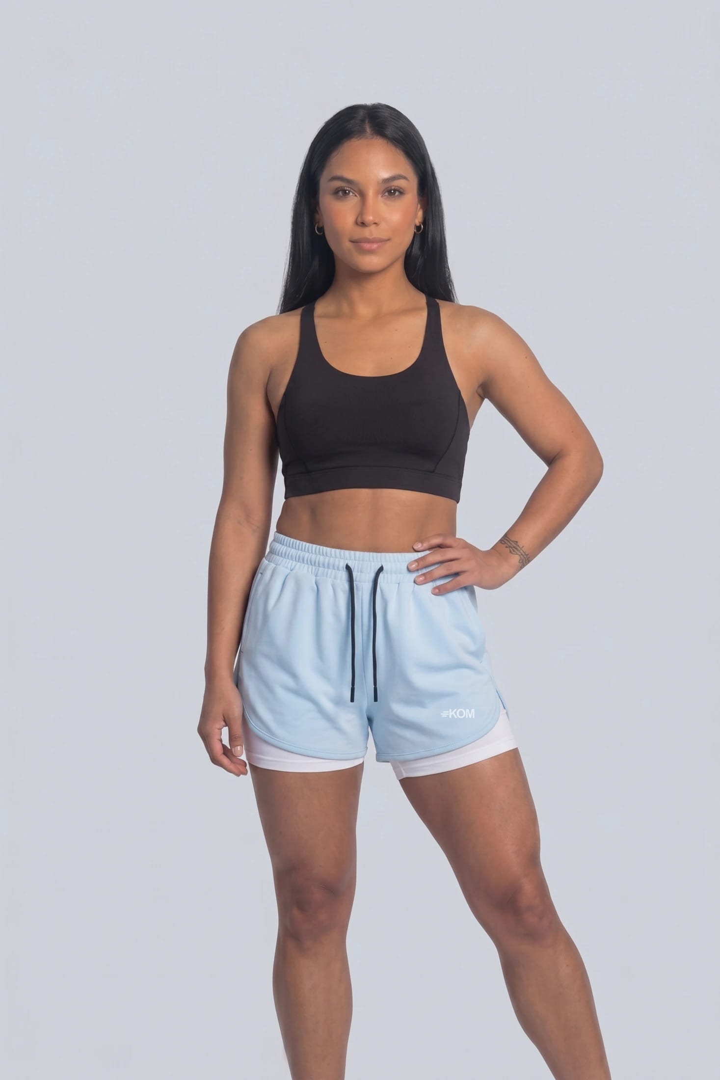 Short Running Deportivo Mujer Línea Giro con Boxer Interno y Bolsillos - imagen 2