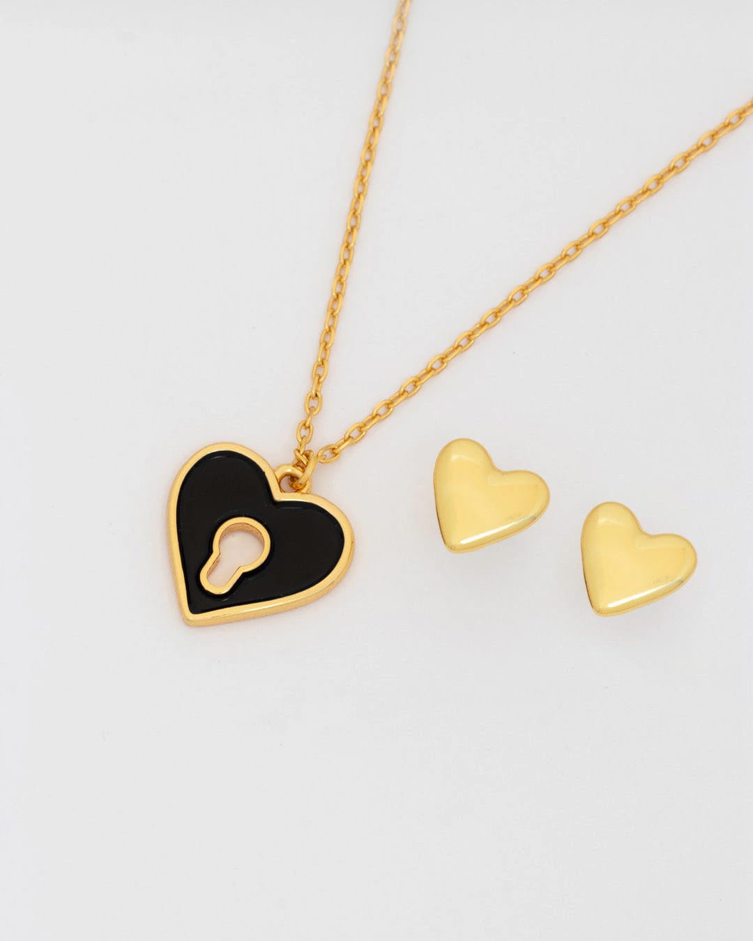 Collar Corazón Cerrojo Negro + Aretes - imagen 1