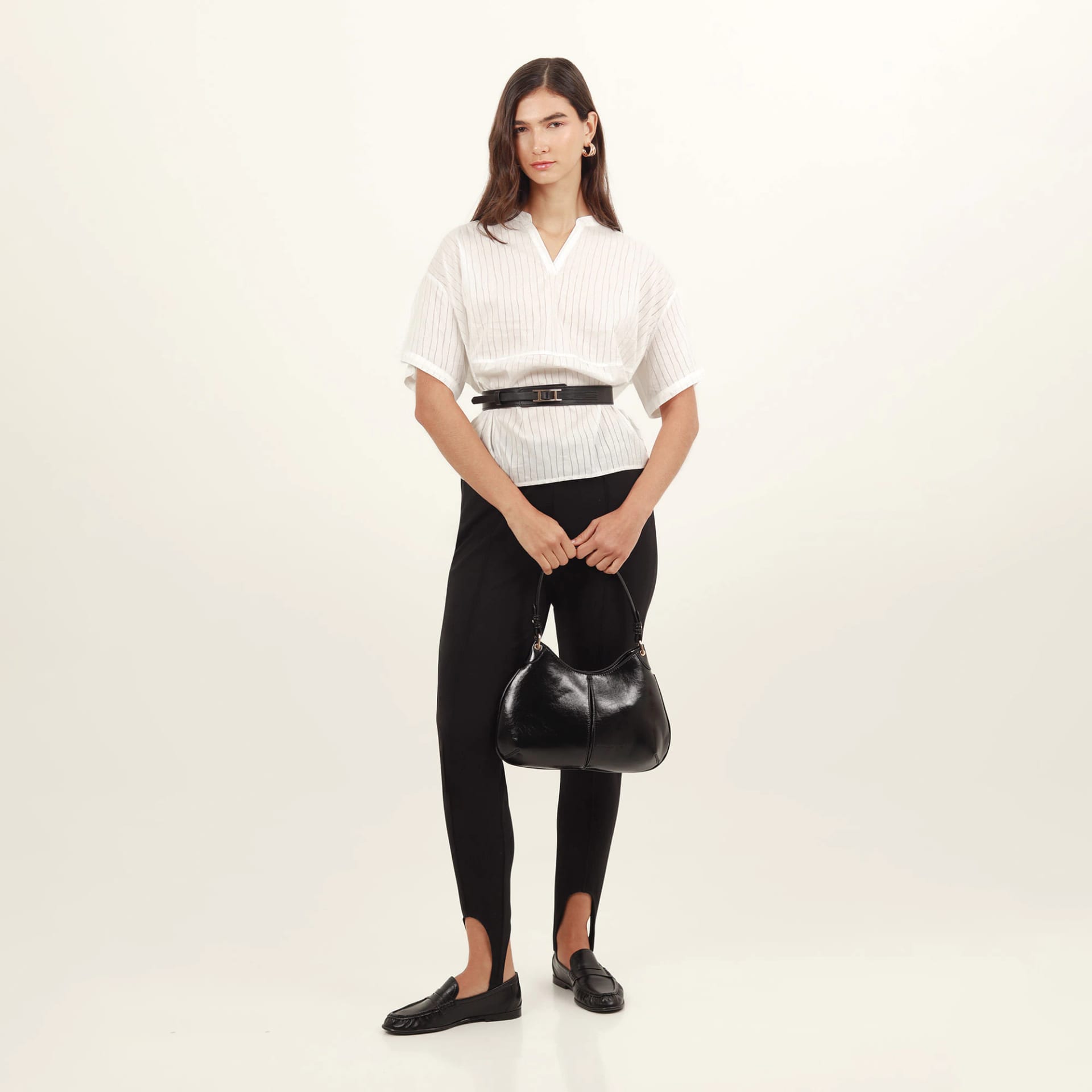 Pantalón con estribo tiro medio bota skinny - imagen 1