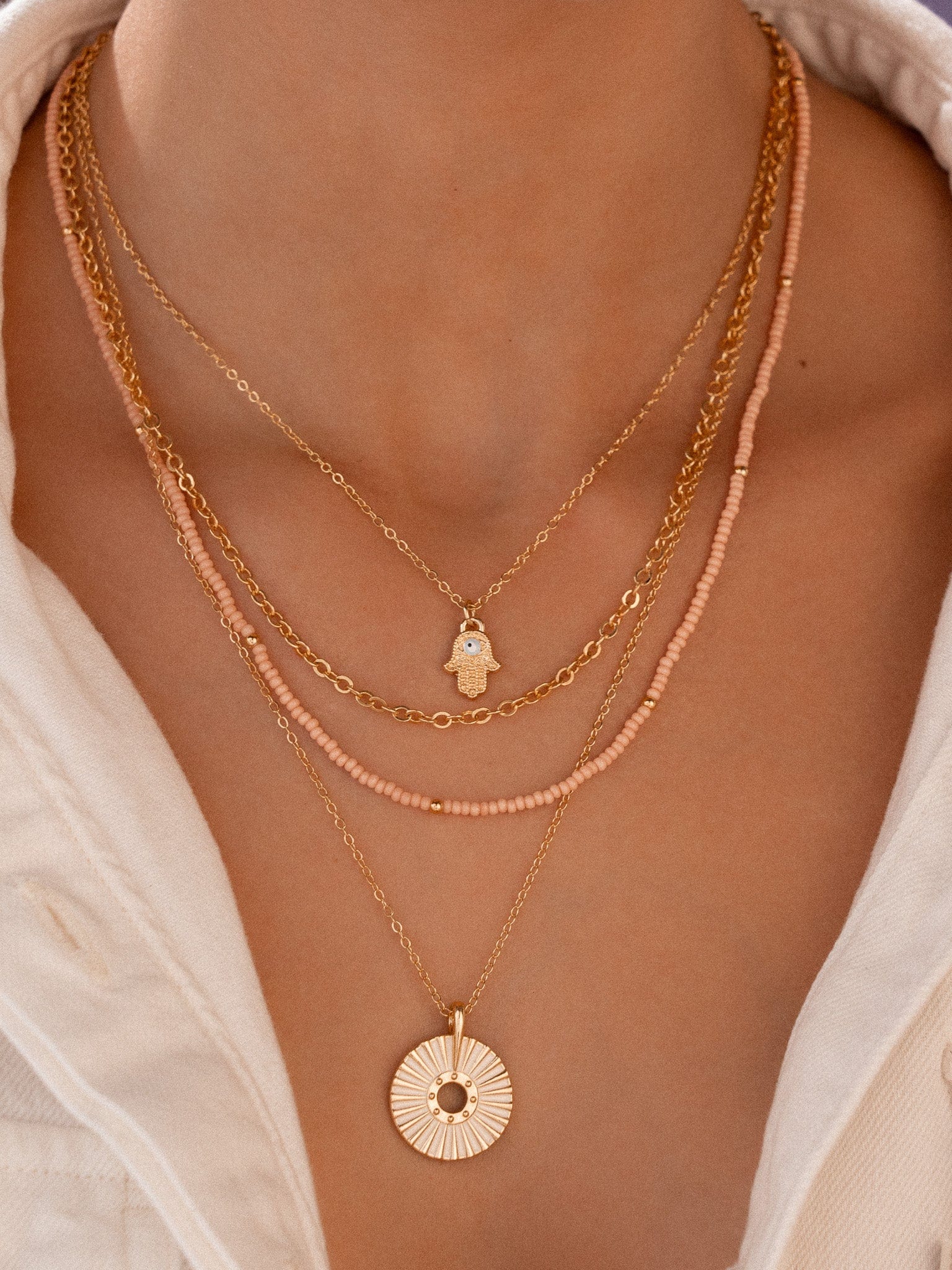 Set Collar Mano Hamsa + Aretes - imagen 1