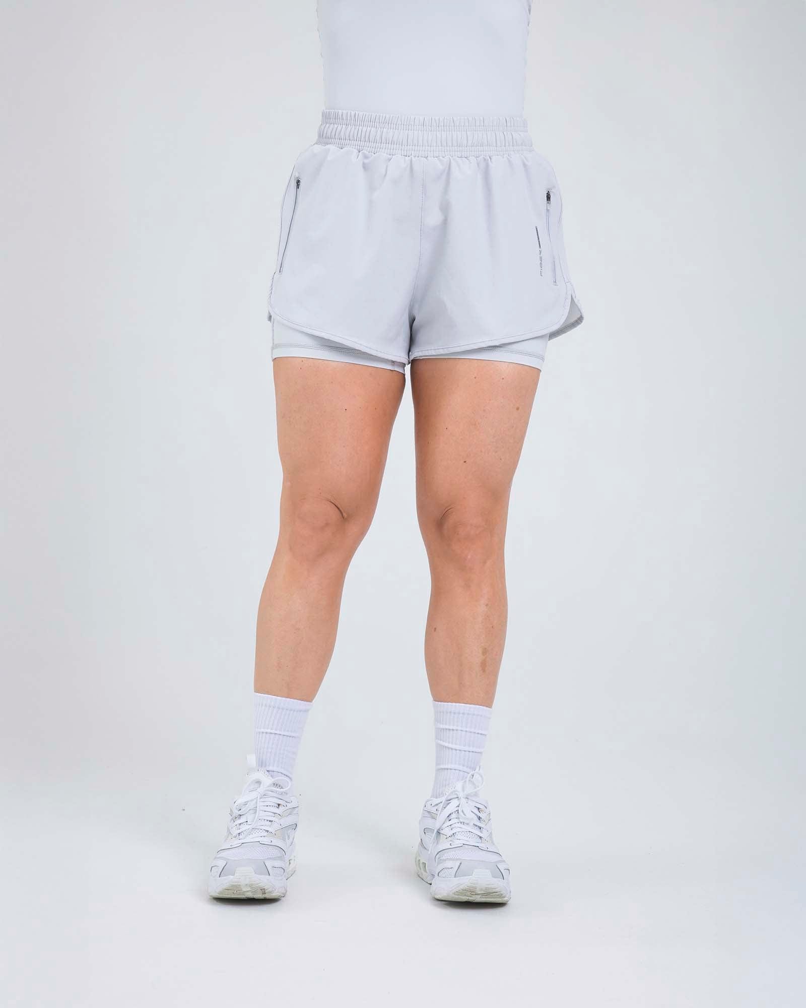 Short running trail dual gris cloud outdoor FIBER - imagen 9