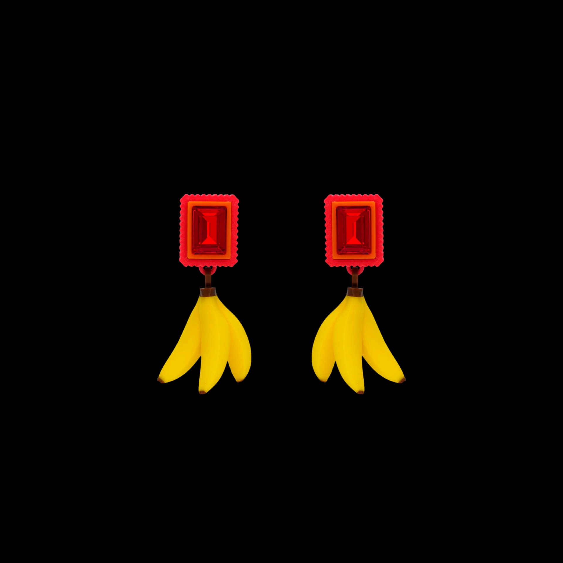 ARETES CRISTAL CON DIJE DE BANANO - imagen 1