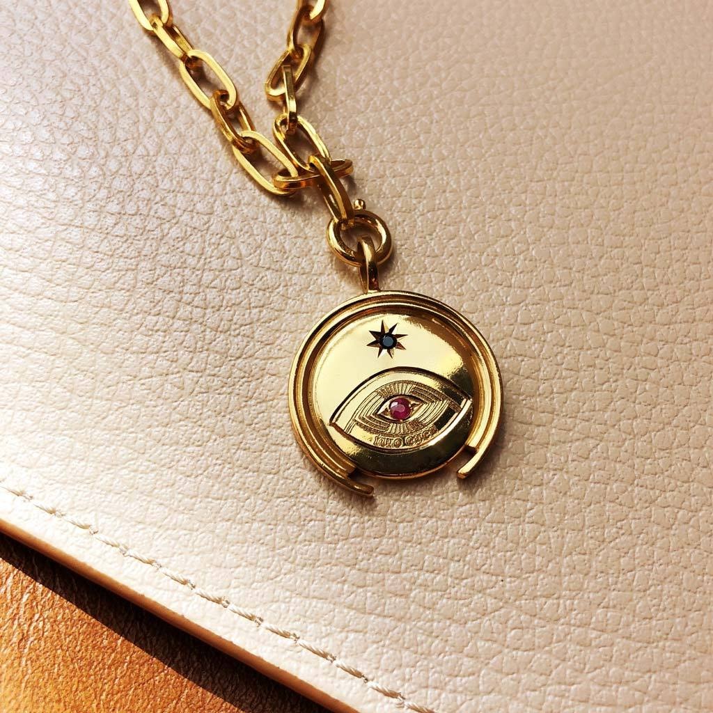 MONEDA SOHUM OJO LUMINI RUBI ORO - imagen 1