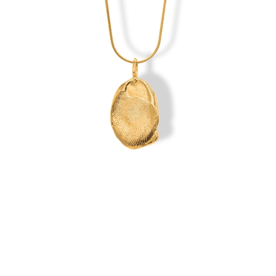 Cadena con dije ovalado con textura - imagen 1